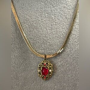 Antique red glass pendant on a vintage Korea herringbone chain
